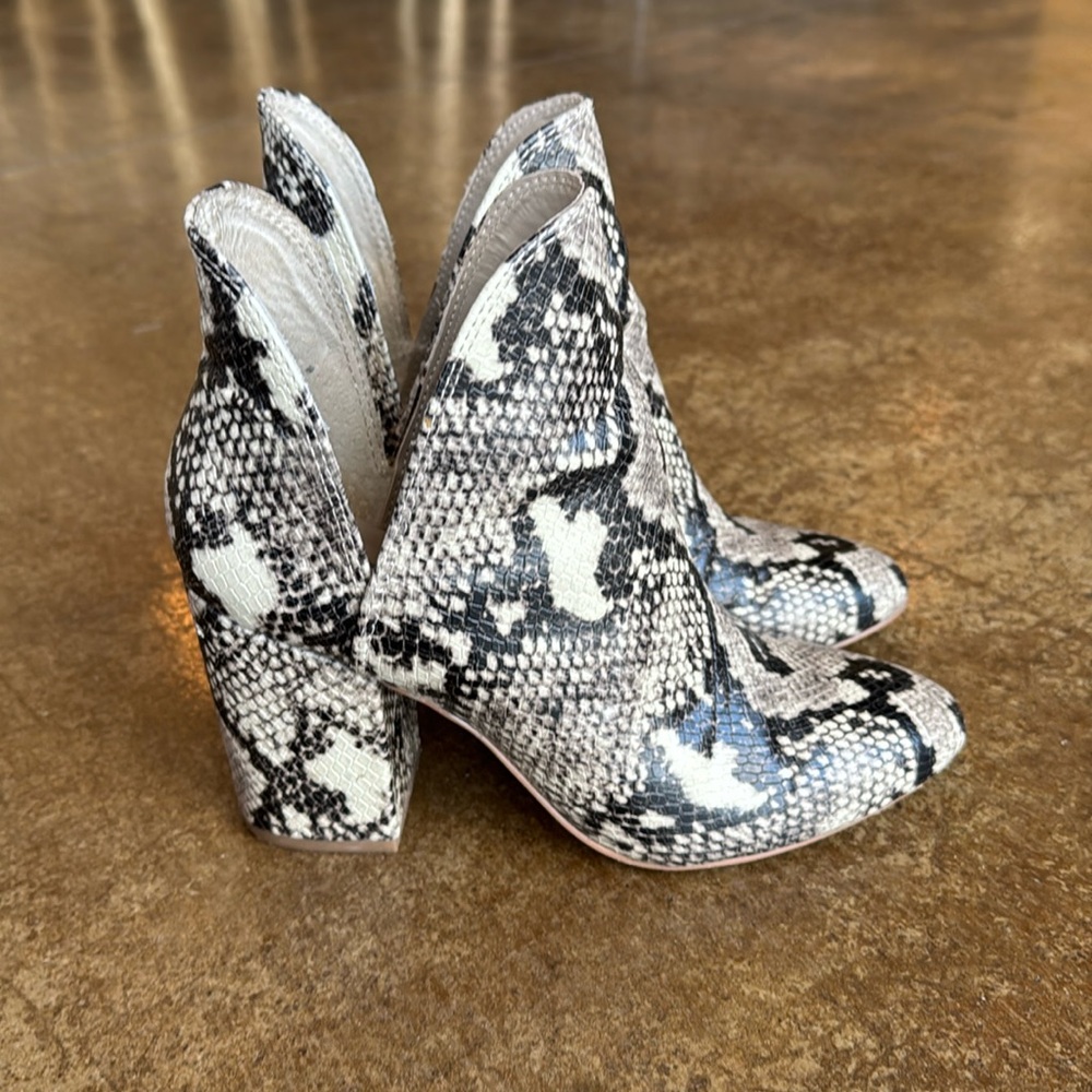 Snake skin booties by Steve Madden